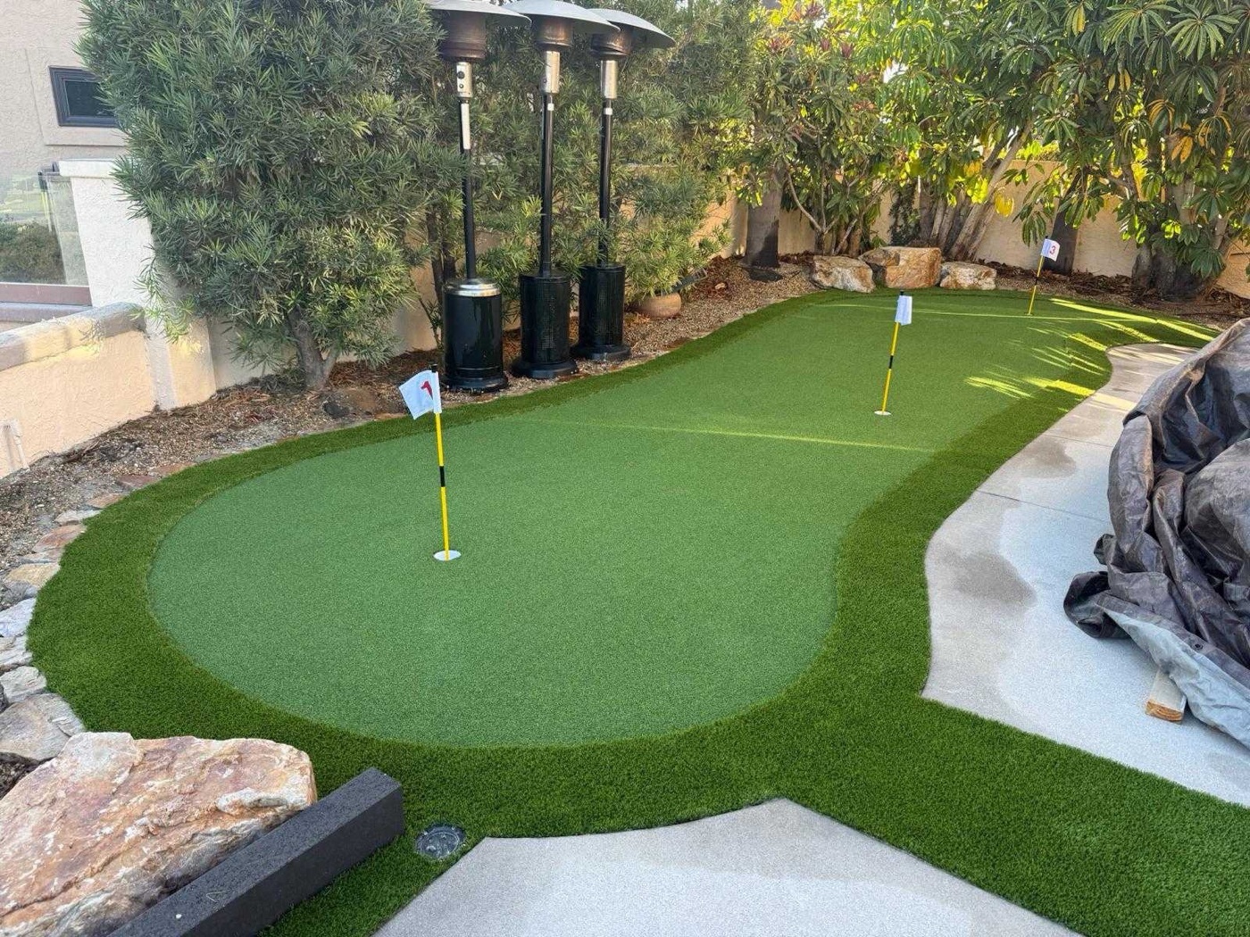 Backyard putting green in Kaplan by Abshire Brothers Lawn & Landscape